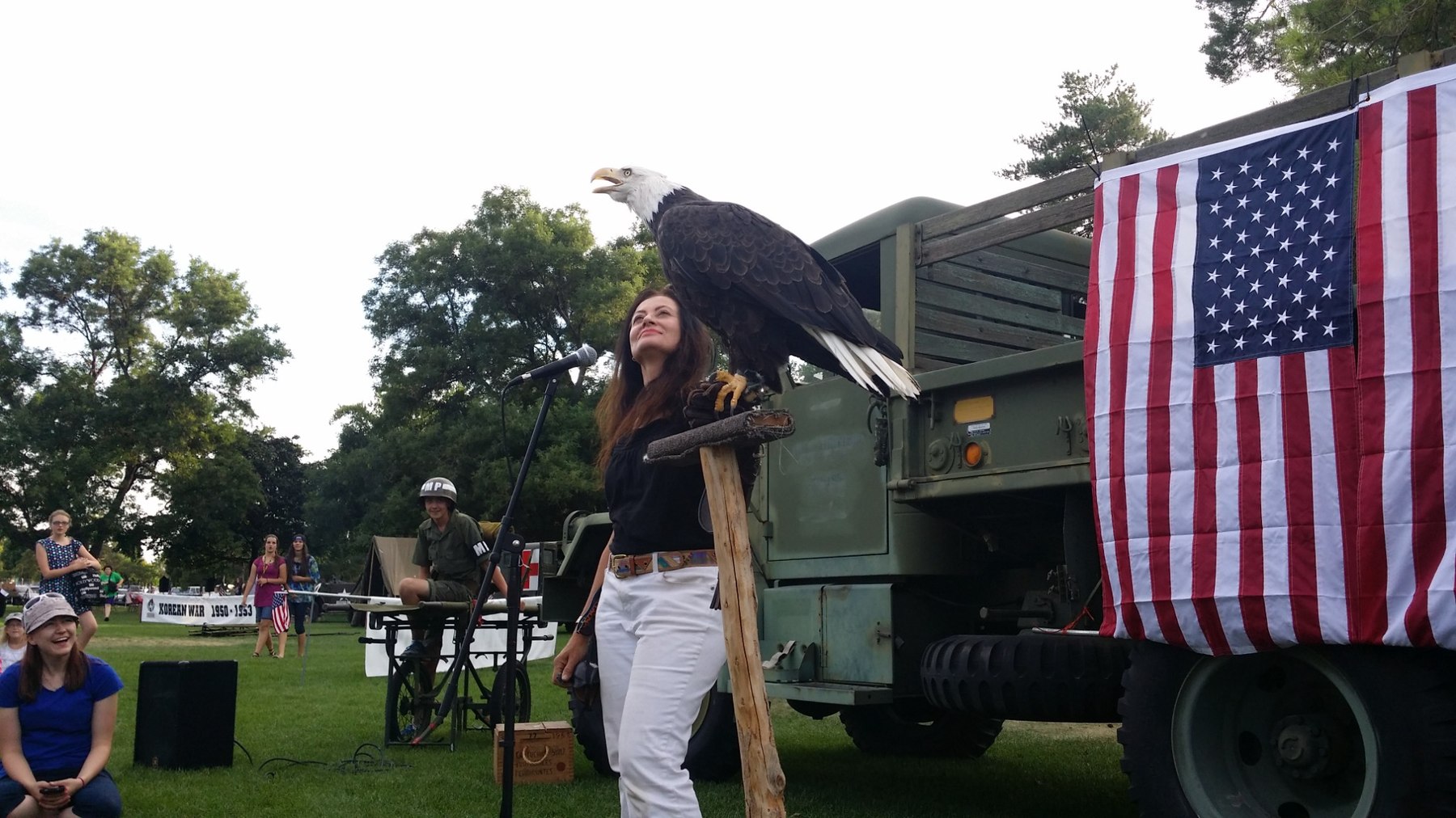 Outdoor Bald Eagle education program at a patriotic community event